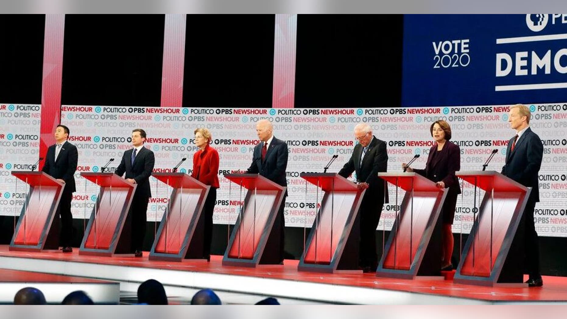 Biden Democratic presidential candidates from left, entrepreneur Andrew Yang, South Bend Mayor Pete Buttigieg, Sen. Elizabeth Warren, D-Mass., former Vice President Joe <a class=