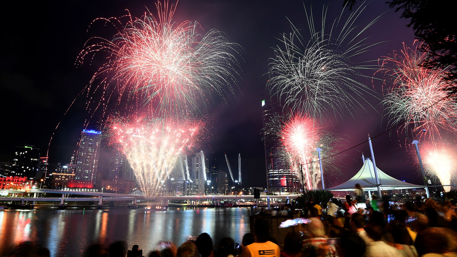 Brisbane, Australia: Crowds watch a fireworks display during New Year's Eve celebrations.