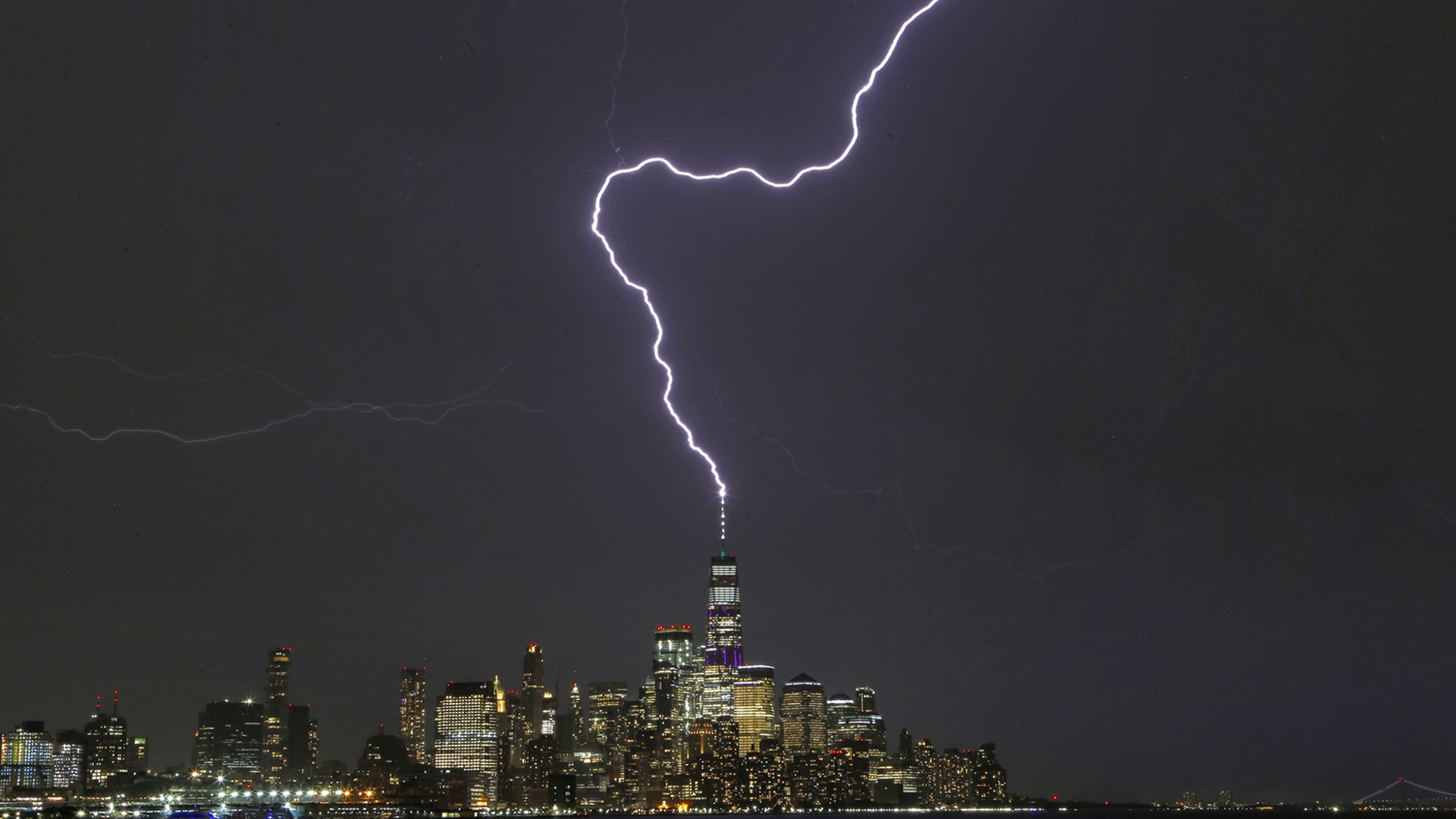Lightning strikes One World Trade Center during a thunderstorm in New York City, July 17, 2019.
