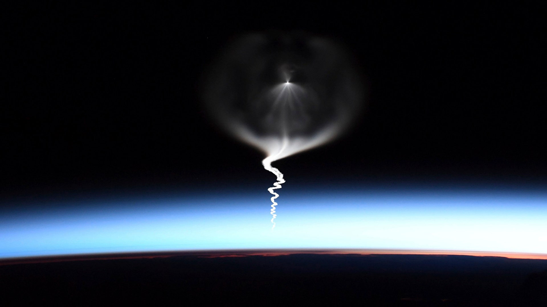 The launch of a Russian Soyuz rocket is seen from the International Space Station, Sept. 25, 2019. 