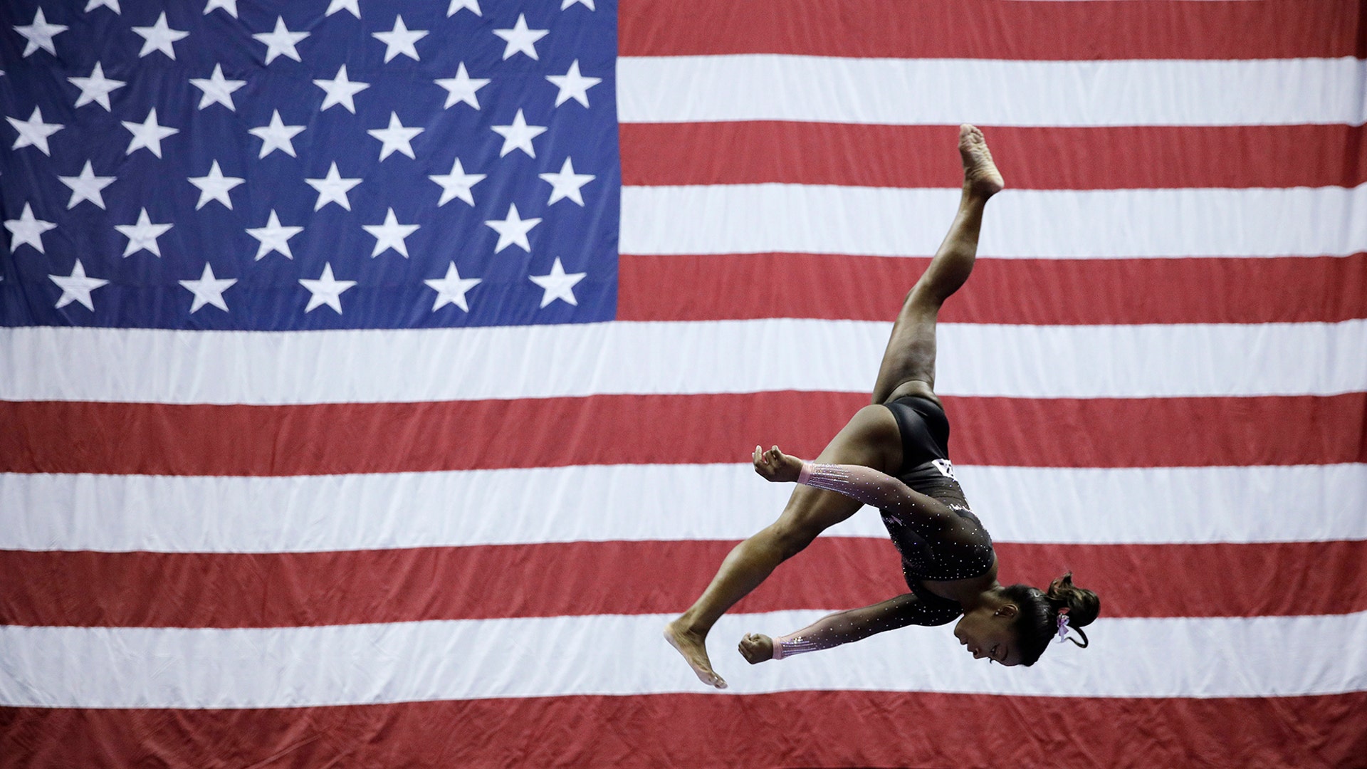 Simone Biles competes on the balance beam during the senior women's competition at the 2019 U.S. Gymnastics Championships in Kansas City, Missouri, Aug. 11, 2019. 