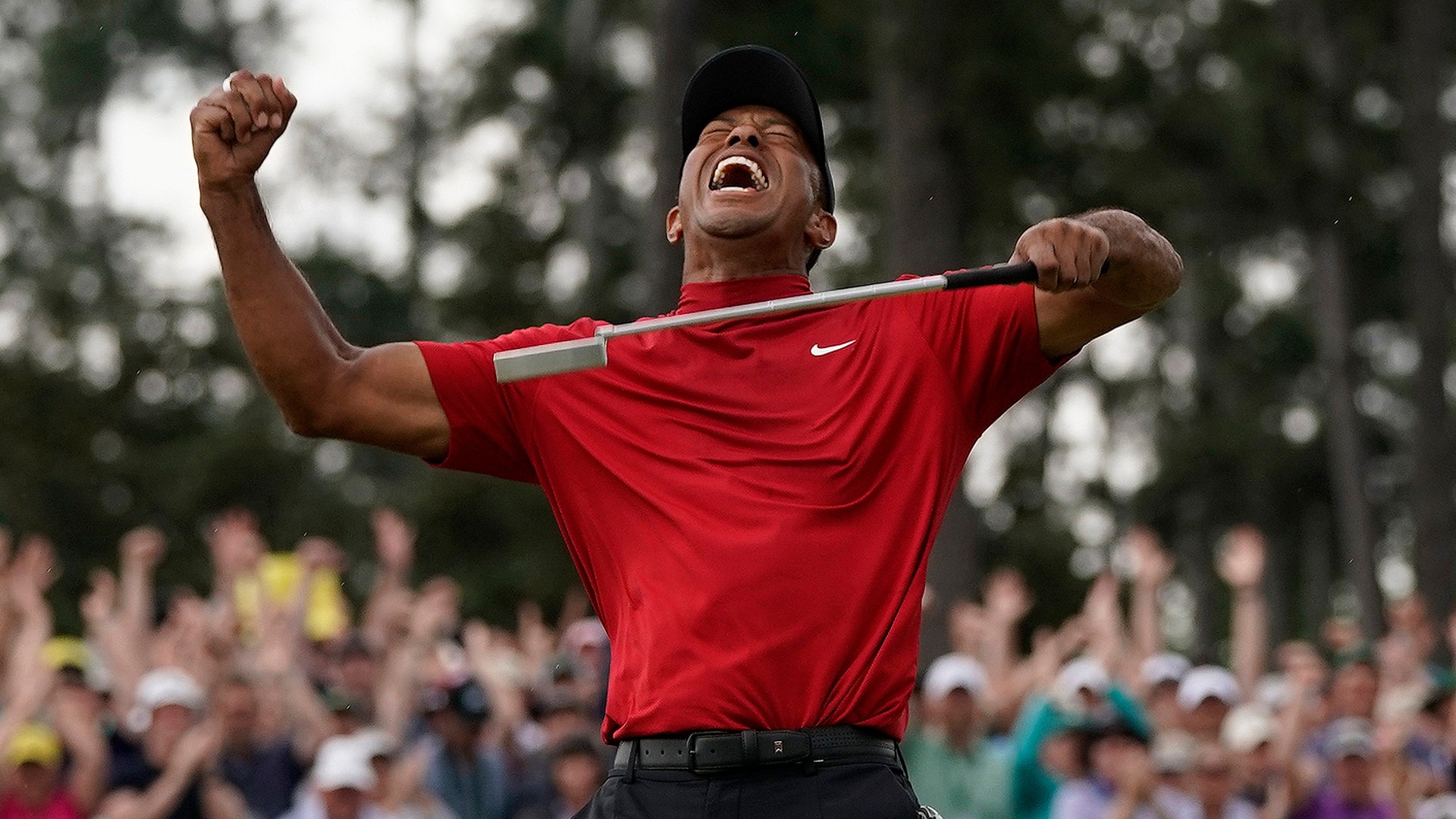 Tiger Woods reacts after winning the Masters golf tournament in Augusta, Georgia, April 14, 2019.