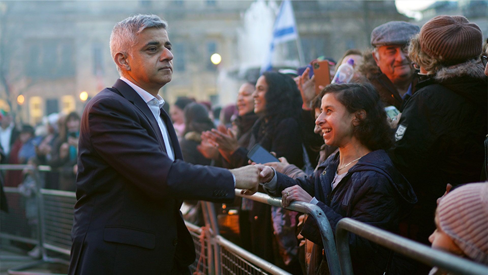 London, England: Mayor Sadiq Khan greets a member of the public during the Chanukah in the Square event at Trafalgar Square on December 22, 2019.