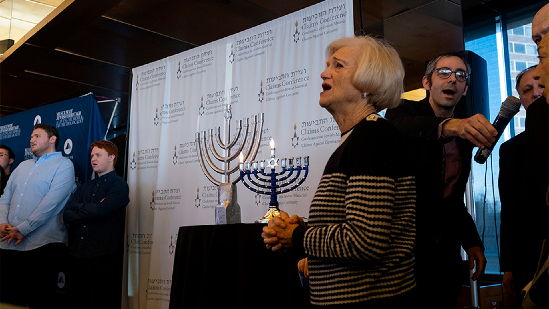 New York, United States: As a menorah is lighted, symbolizing the first day of Hanukkah, survivors of the Holocaust and other participants gather at the Museum of Jewish Heritage, to recognize International Holocaust Survivors Night.