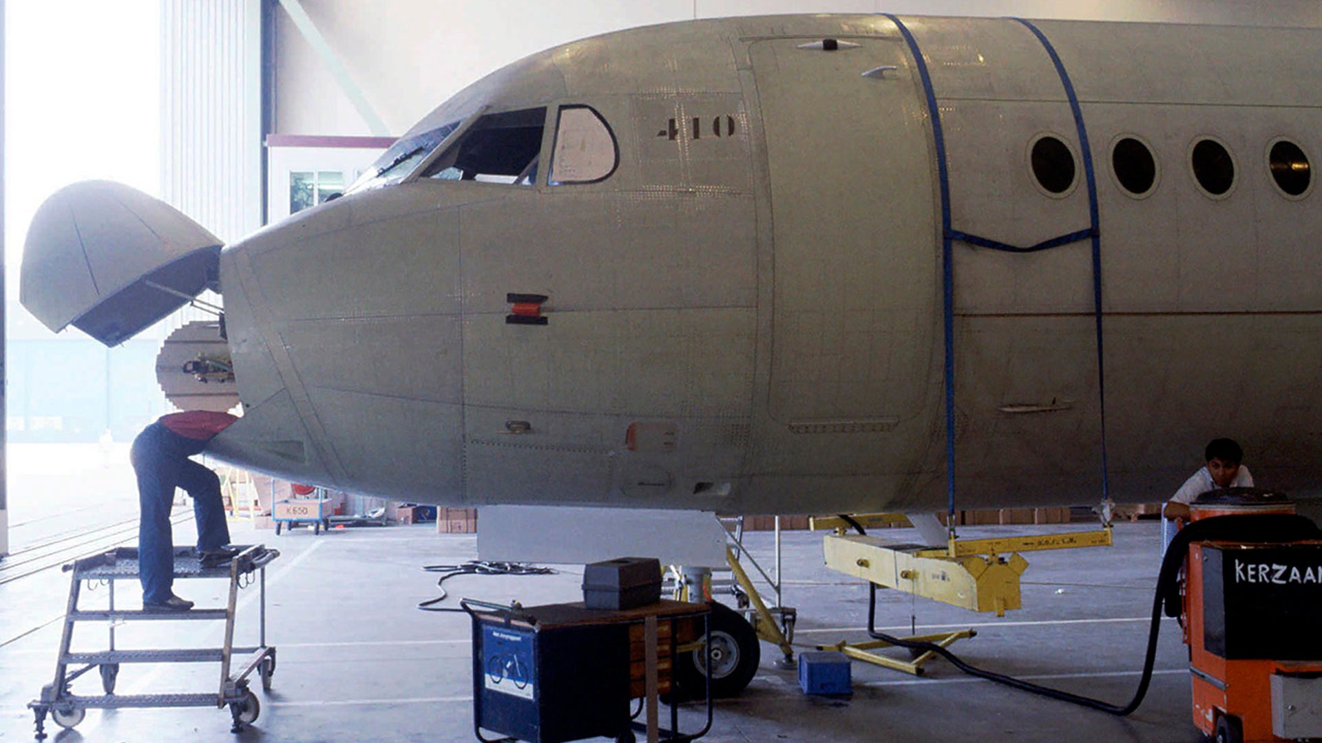 In this Jan. 22, 1995, file photo, an employee of aircraft builder Fokker works in the nose of a Fokker-100 jet at the company's Amsterdam-Schiphol facility.