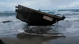 Japan police find human remains in 'ghost boat' suspected from North Korea