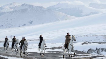 Kim Jong Un rides white horse through historic battlefields, experts see symbolism