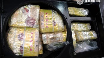 Australian customs agents, IT worker charged in country's largest crystal meth seizure