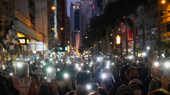 Massive rally in Hong Kong marks six months of protests