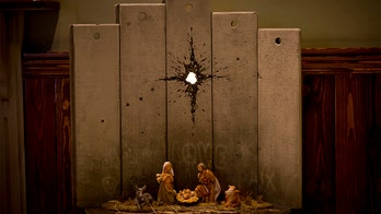 Banksy's new artwork - a Nativity scene - makes political statement in Bethlehem
