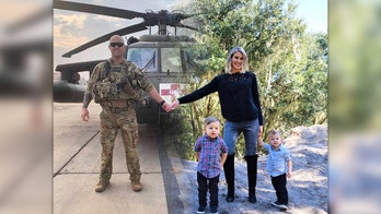 Military wife's Christmas card photo includes deployed husband
