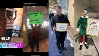 Missouri dad's elaborate airport signs embarrass daughter, delight everyone else