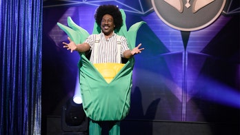 Bill Cosby's publicist calls Eddie Murphy a 'Hollywood Slave' after 'SNL' jab