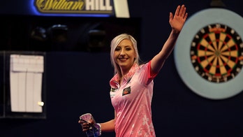 Female darts player makes history at world championship