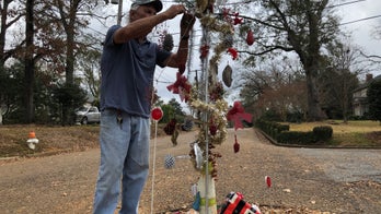 Mississippi residents put makeshift Christmas tree into pothole in hopes of getting street fixed