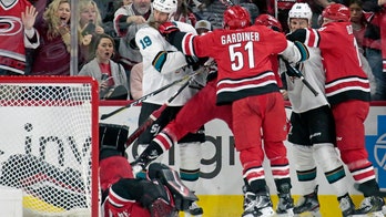 San Jose Sharks' Joe Thornton jabs Carolina Hurricanes' Petr Mrazek in the face, sparking fight