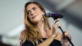 Country singer Kassi Ashton uses steamy bikini snap to get revenge on boy who was mean to her at 13