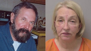 Wisconsin woman who offered reward in husband's murder charged with killing him