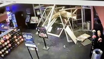 Video shows Maryland kidnapping suspect crashing into bowling alley