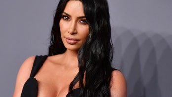 Kim Kardashian channels Elizabeth Taylor in sexy photo shoot
