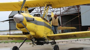 Crop duster sprinkles holy water down on Louisiana town