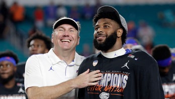 Perine leads No. 6 Gators past Virginia 36-28 in Orange Bowl