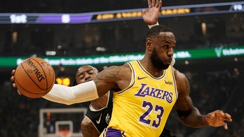 James misses 1st game of season for Lakers