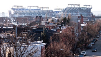 Body found inside portable toilet near Baltimore Ravens' stadium, police say