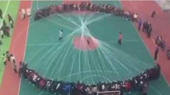 Video of students jumping massive rope in schoolyard stuns the Internet