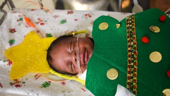 NICU babies don festive holiday garb in special photo shoot