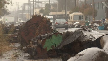 Oakland's rising homelessness crisis prompts DIY effort using large logs