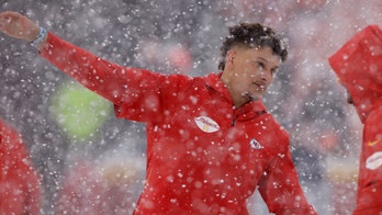 Kansas City Chiefs players get into snowball fight prior to game vs. Denver Broncos