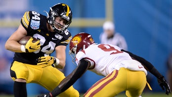 Smith-Marsette has 3 TDs, Iowa beats USC in Holiday Bowl