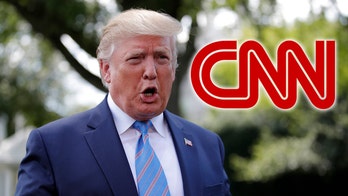 Trump rips 'Fake News' CNN, demands retraction over report he still uses personal cellphone