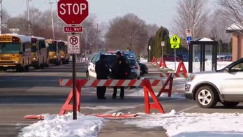 Armed Wisconsin high school student, resource officer injured in shooting incident