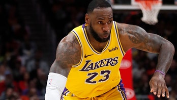 Fan throws debris at LeBron James' son, NBA superstar calls it