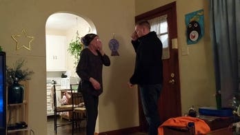 Mom surprised by son on Christmas Eve during cancer battle last year now celebrating remission