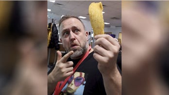 British man keeps massive potato chip in display case