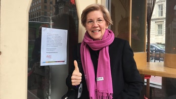 Elizabeth Warren says she'll wear Planned Parenthood scarf to her inauguration