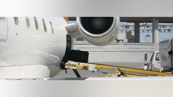 Man breaches security at Boston's Logan airport, climbs into plane's cargo hold