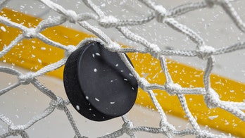 Minor league hockey player stretchered off ice after taking brutal punch during fight