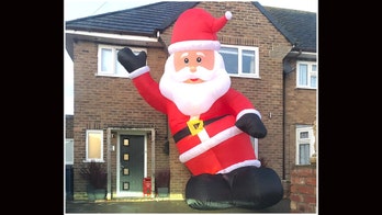 Dad orders wrong inflatable Santa, watches it inflate to the size of his two-story house