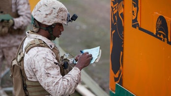 US Marine, who enlisted after surviving Haiti earthquake, charged with smuggling guns