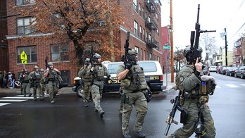 Arrest in Jersey City shooting after man's phone number found in shooter's pocket