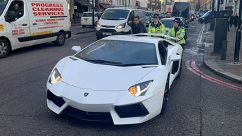 Crowd laughs as cops push busted $400,000 Lamborghini down fancy London street