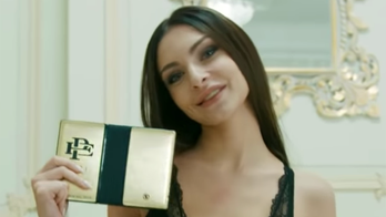 Pablo Escobar's brother made an 'unbreakable' smartphone and is using scantily clad women to sell it