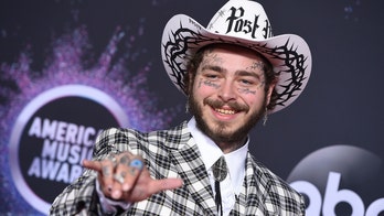 Post Malone celebrates the new year with huge face tattoo: 'Gauntlet on the baby boy'