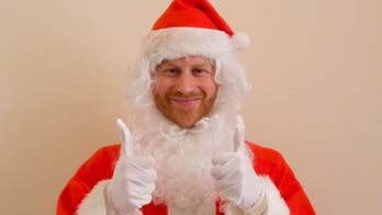 Prince Harry dresses up as Santa with a huge belly for a cute children’s charity message about losing a parent