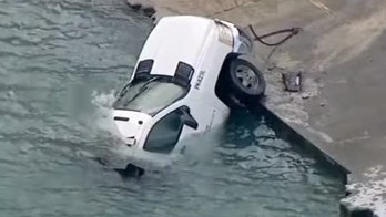 Chicago salt truck slides on icy road into Lake Michigan, workers escaped