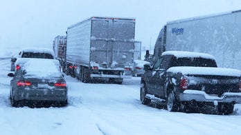 Southern California slammed by winter snow storm, stranding holiday travelers; system now heads east